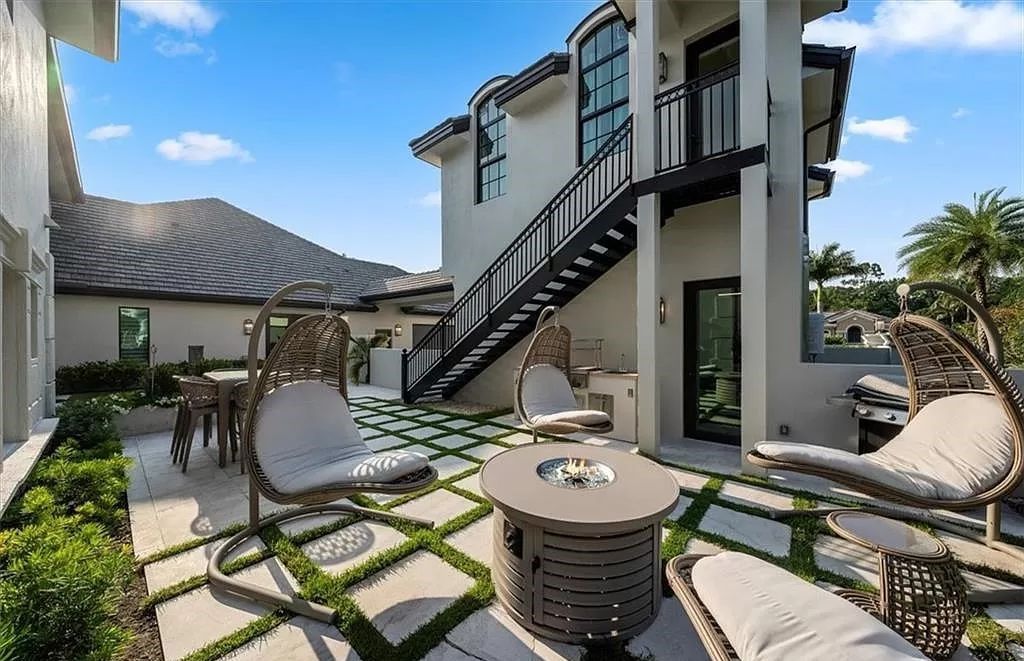Welcome to 6536 Highcroft Drive in Quail West, Naples, Florida - a home where luxury meets comfort in every detail.