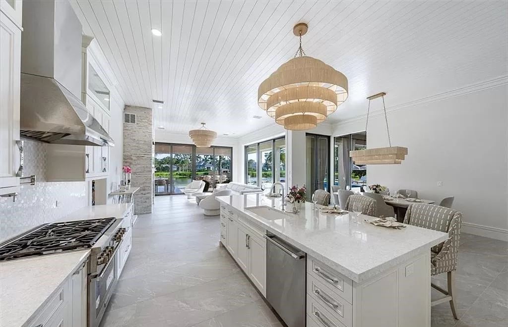Welcome to 6536 Highcroft Drive in Quail West, Naples, Florida - a home where luxury meets comfort in every detail.