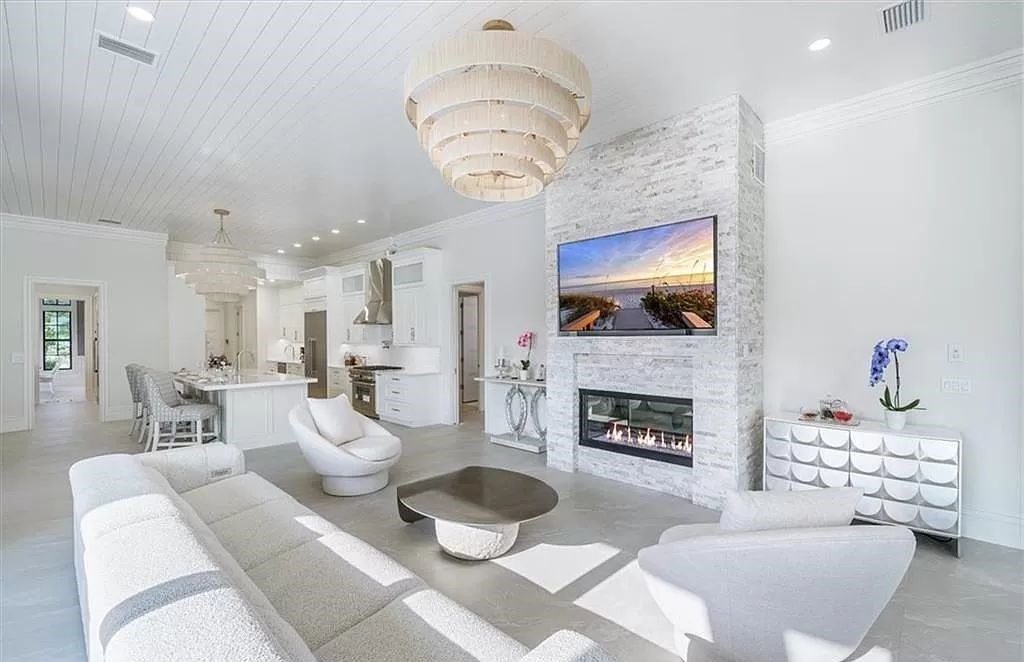 Welcome to 6536 Highcroft Drive in Quail West, Naples, Florida - a home where luxury meets comfort in every detail.