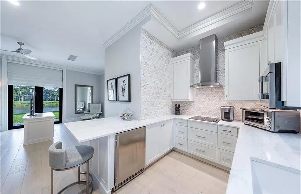 Welcome to 6536 Highcroft Drive in Quail West, Naples, Florida - a home where luxury meets comfort in every detail.