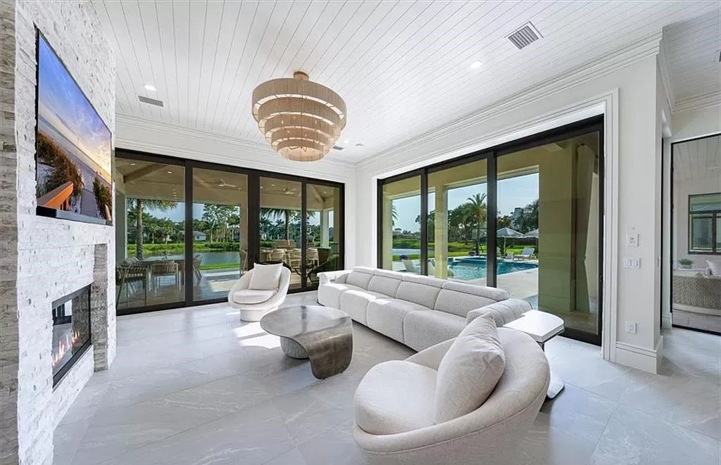 Welcome to 6536 Highcroft Drive in Quail West, Naples, Florida - a home where luxury meets comfort in every detail.