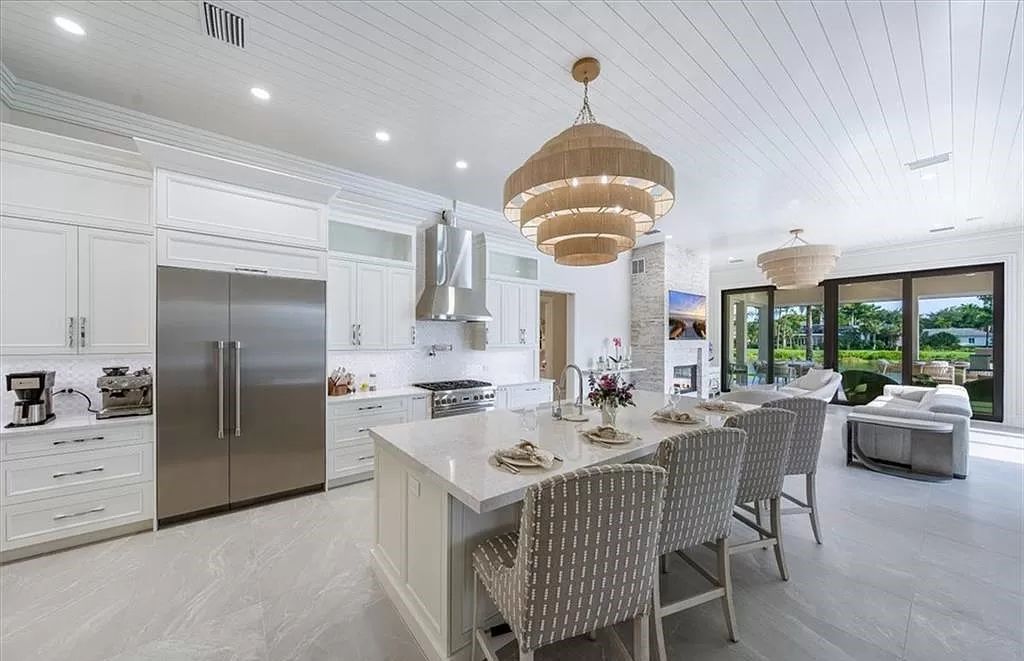 Welcome to 6536 Highcroft Drive in Quail West, Naples, Florida - a home where luxury meets comfort in every detail.