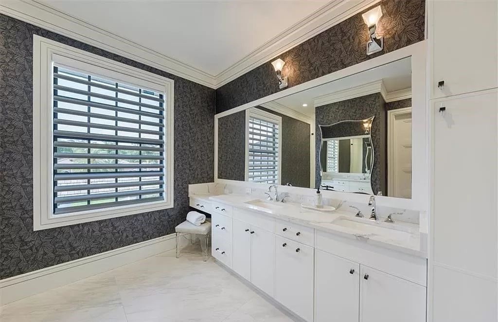Welcome to 6536 Highcroft Drive in Quail West, Naples, Florida - a home where luxury meets comfort in every detail.