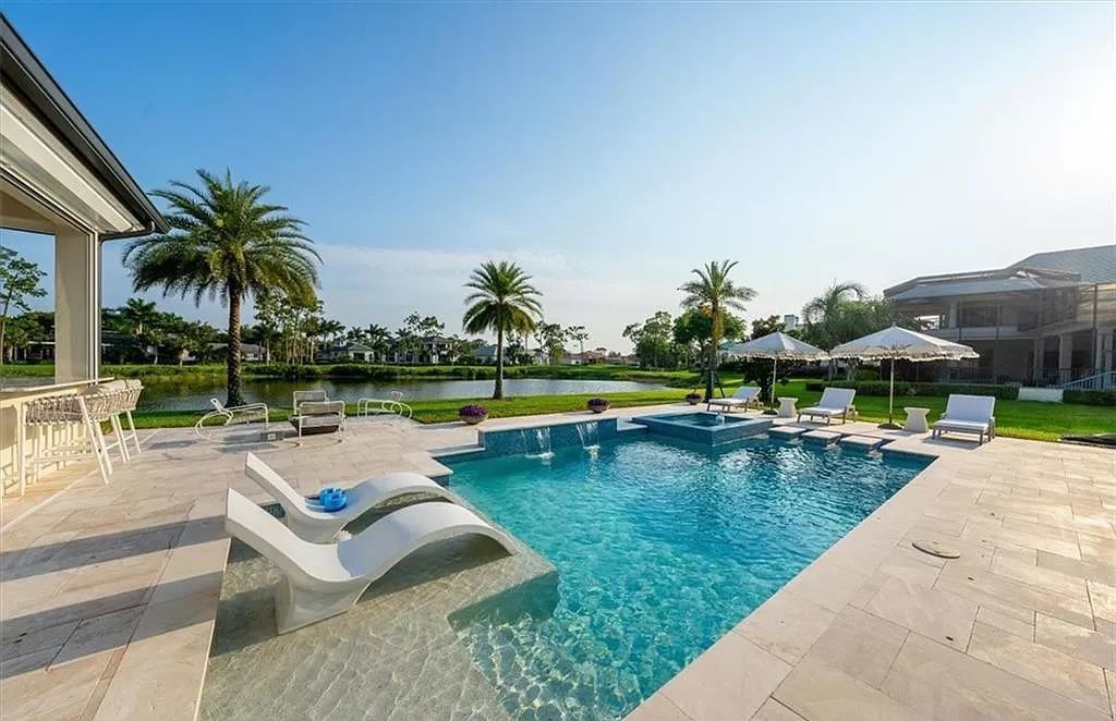 Welcome to 6536 Highcroft Drive in Quail West, Naples, Florida - a home where luxury meets comfort in every detail.