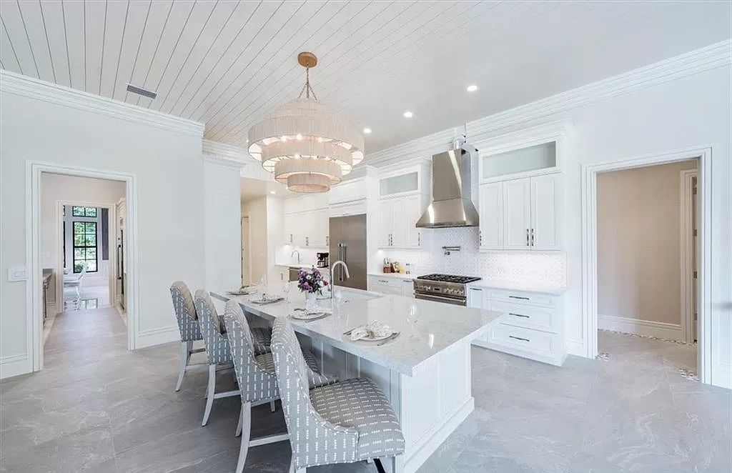 Welcome to 6536 Highcroft Drive in Quail West, Naples, Florida - a home where luxury meets comfort in every detail.