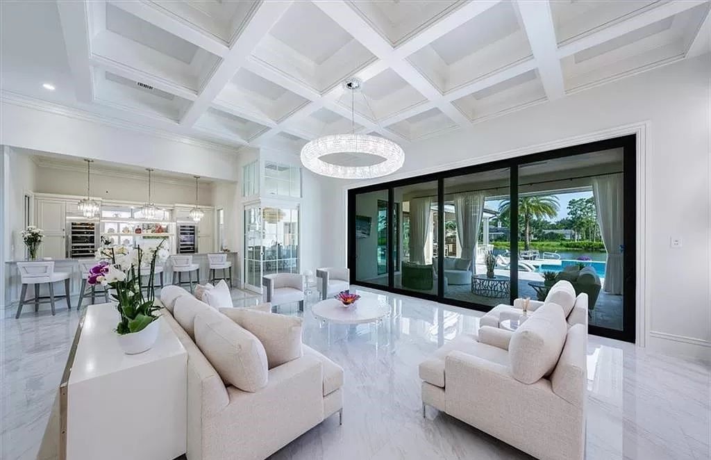 Welcome to 6536 Highcroft Drive in Quail West, Naples, Florida - a home where luxury meets comfort in every detail.