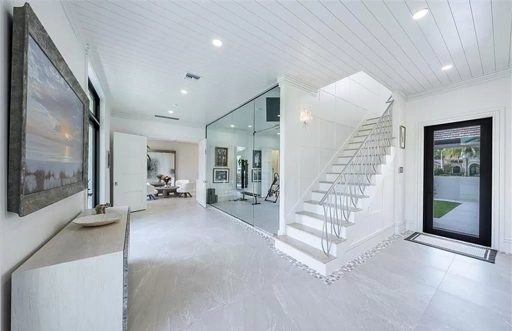 Welcome to 6536 Highcroft Drive in Quail West, Naples, Florida - a home where luxury meets comfort in every detail.