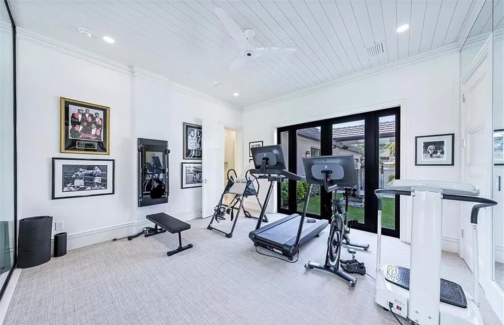 Welcome to 6536 Highcroft Drive in Quail West, Naples, Florida - a home where luxury meets comfort in every detail.