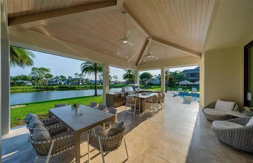 Welcome to 6536 Highcroft Drive in Quail West, Naples, Florida - a home where luxury meets comfort in every detail.