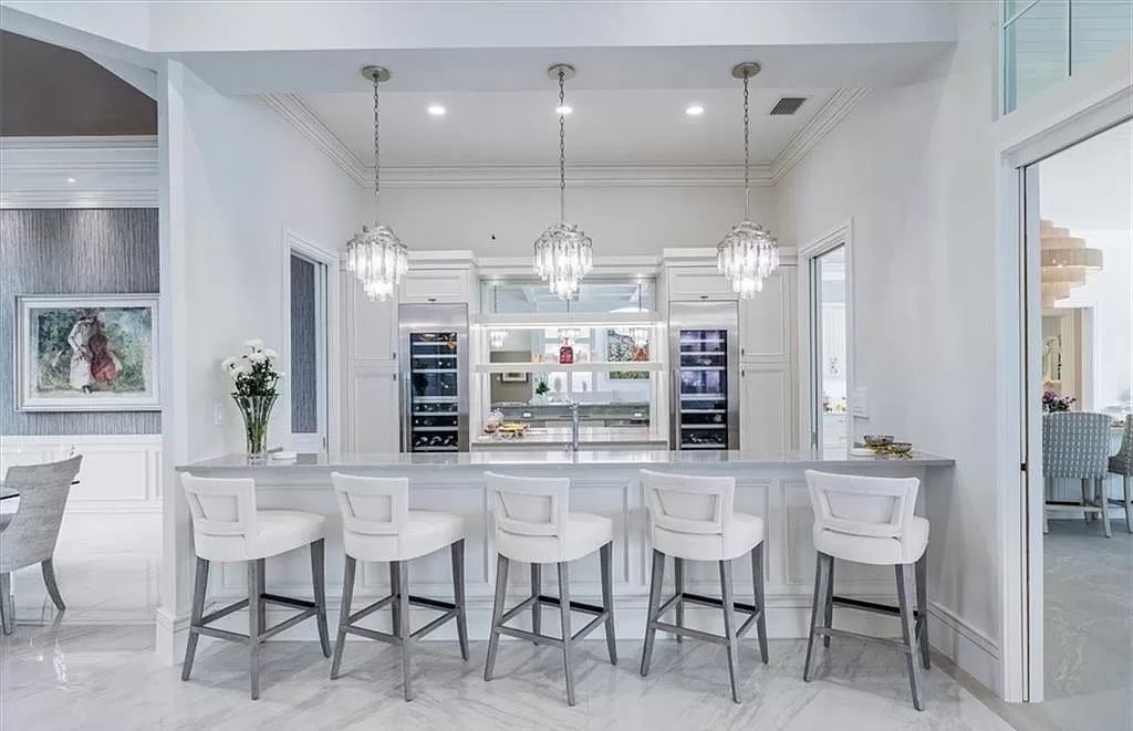 Welcome to 6536 Highcroft Drive in Quail West, Naples, Florida - a home where luxury meets comfort in every detail.
