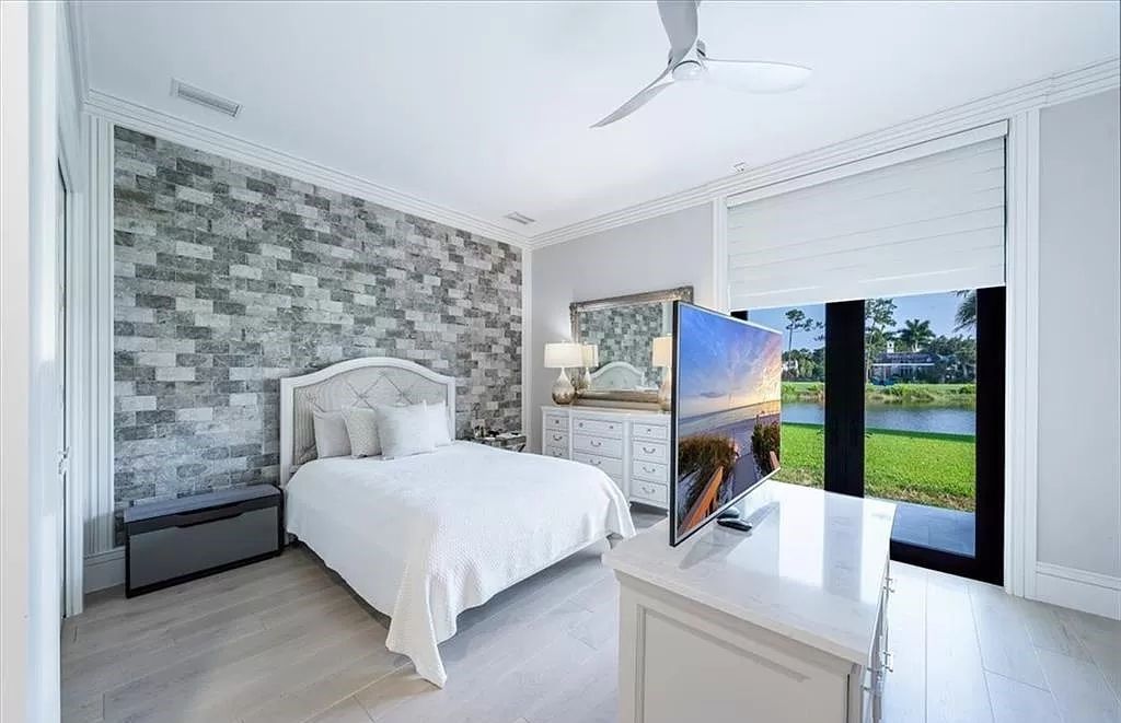 Welcome to 6536 Highcroft Drive in Quail West, Naples, Florida - a home where luxury meets comfort in every detail.