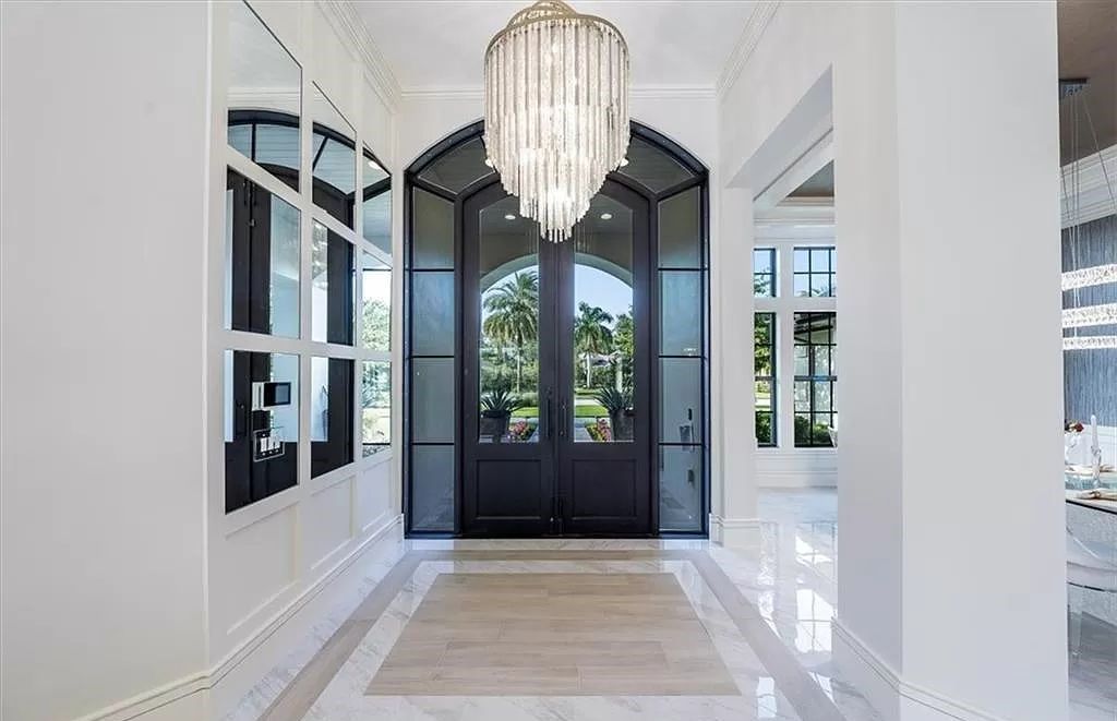 Welcome to 6536 Highcroft Drive in Quail West, Naples, Florida - a home where luxury meets comfort in every detail.