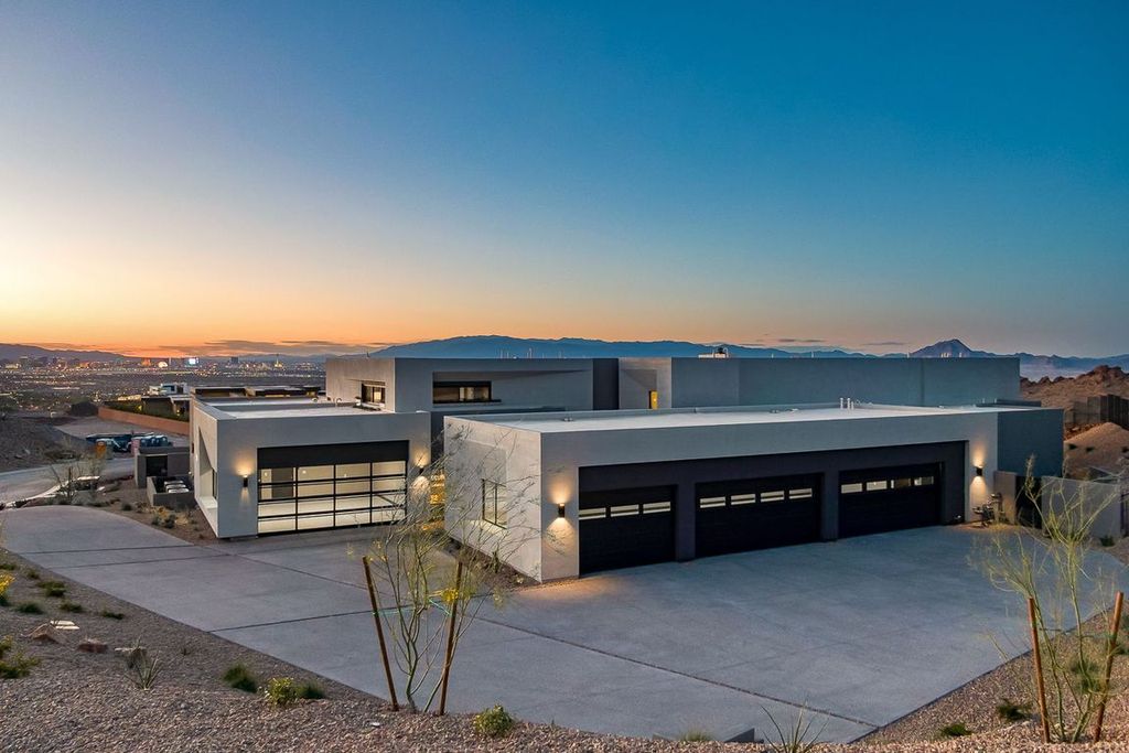 709 Dragon Peak Drive Home in Henderson, Nevada. Discover the thrill of living at Drift, an extraordinary residence from The Luminary Collection, fully furnished by Atelier Blue Heron Interiors and ready for immediate move-in. Nestled within the exclusive guard-gated enclave of MacDonald Highlands, Drift offers an enviable address on Dragon Peak Drive, often hailed as the Hollywood Hills of Las Vegas.