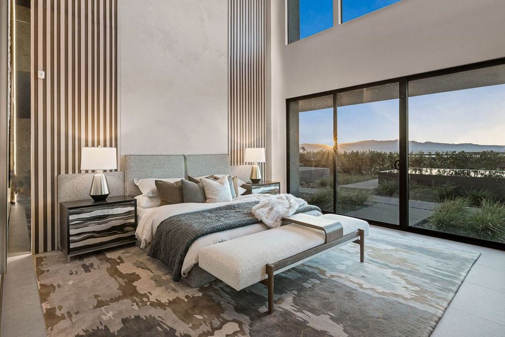 709 Dragon Peak Drive Home in Henderson, Nevada. Discover the thrill of living at Drift, an extraordinary residence from The Luminary Collection, fully furnished by Atelier Blue Heron Interiors and ready for immediate move-in. Nestled within the exclusive guard-gated enclave of MacDonald Highlands, Drift offers an enviable address on Dragon Peak Drive, often hailed as the Hollywood Hills of Las Vegas.