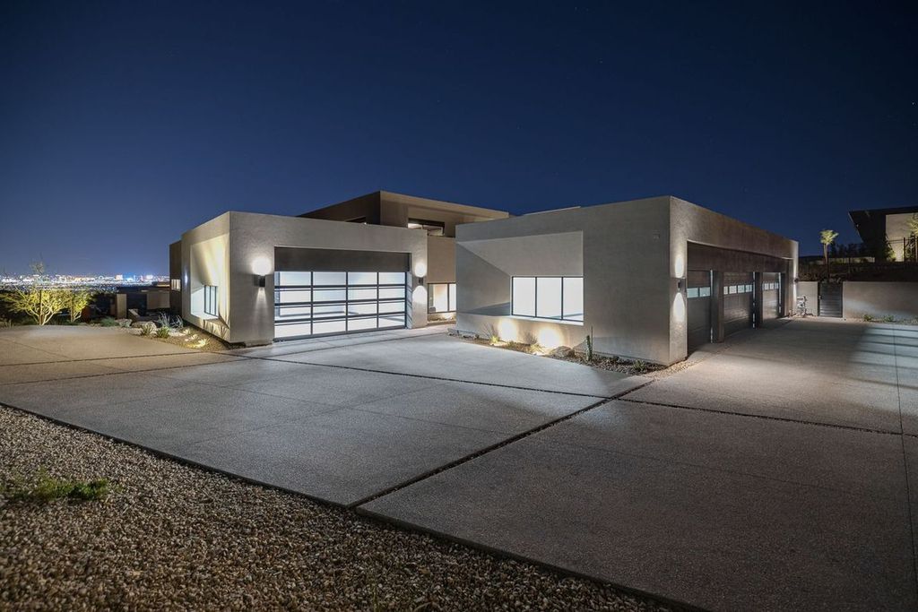 709 Dragon Peak Drive Home in Henderson, Nevada. Discover the thrill of living at Drift, an extraordinary residence from The Luminary Collection, fully furnished by Atelier Blue Heron Interiors and ready for immediate move-in. Nestled within the exclusive guard-gated enclave of MacDonald Highlands, Drift offers an enviable address on Dragon Peak Drive, often hailed as the Hollywood Hills of Las Vegas.