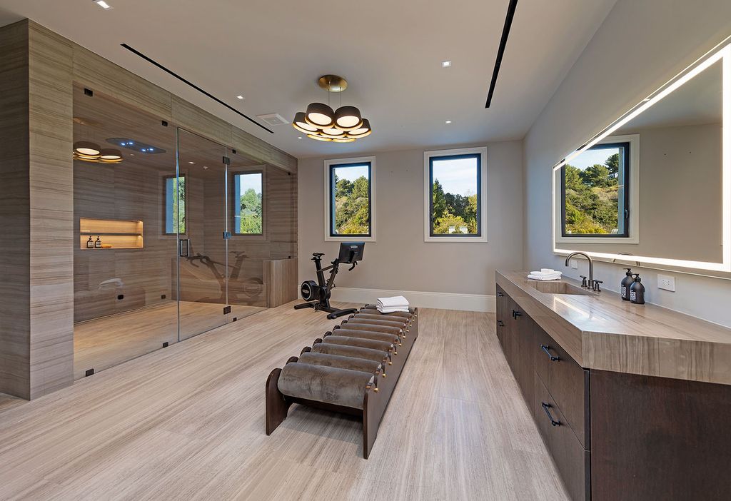 73 Beverly Park Lane Home in Beverly Hills, California. Explore the epitome of luxury living at 73 Beverly Park Lane, nestled within the prestigious Beverly Park enclave. This world-class estate offers unparalleled privacy, breathtaking views, and a meticulously designed open layout ideal for both intimate gatherings and large events. 