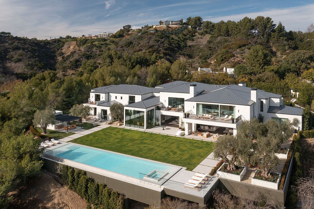 73 Beverly Park Lane Home in Beverly Hills, California. Explore the epitome of luxury living at 73 Beverly Park Lane, nestled within the prestigious Beverly Park enclave. This world-class estate offers unparalleled privacy, breathtaking views, and a meticulously designed open layout ideal for both intimate gatherings and large events. 