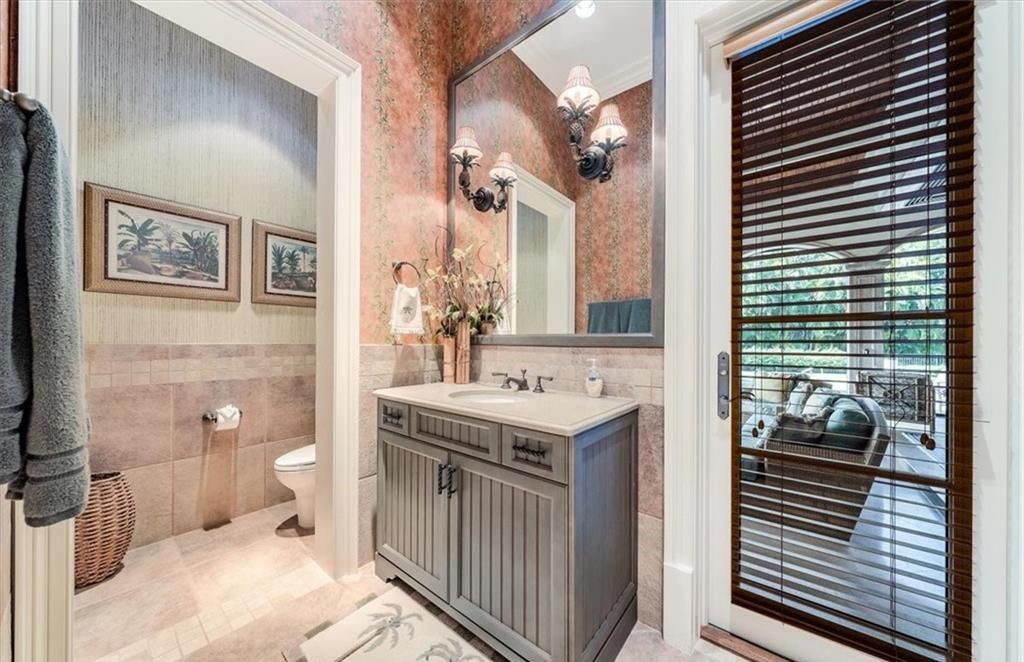 Discover an exquisite 6,500 sq ft single-level home at 2116 Canna Way, Naples, FL, set on a stunning 0.78-acre lot with picturesque lake and golf course views.