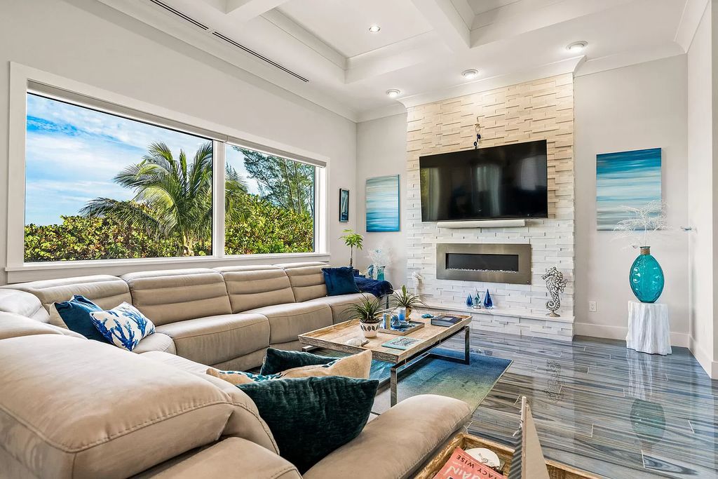 With dual A/C garages and durable coastal design elements throughout, including marine-grade paint and impact glass, this 3-bedroom, 5-bathroom home on a 0.65-acre lot at 3800 Anacostia Pl, Fort Pierce, FL 34949, built in 2019, presents an exceptional opportunity to embrace the coastal lifestyle in utmost comfort and elegance.