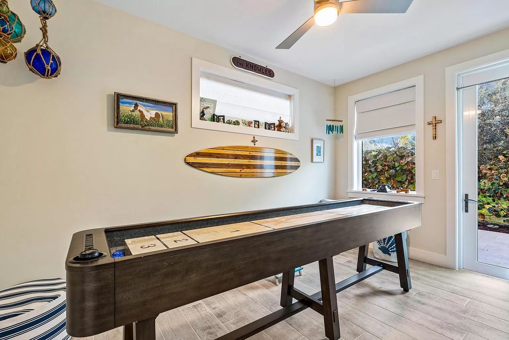 With dual A/C garages and durable coastal design elements throughout, including marine-grade paint and impact glass, this 3-bedroom, 5-bathroom home on a 0.65-acre lot at 3800 Anacostia Pl, Fort Pierce, FL 34949, built in 2019, presents an exceptional opportunity to embrace the coastal lifestyle in utmost comfort and elegance.