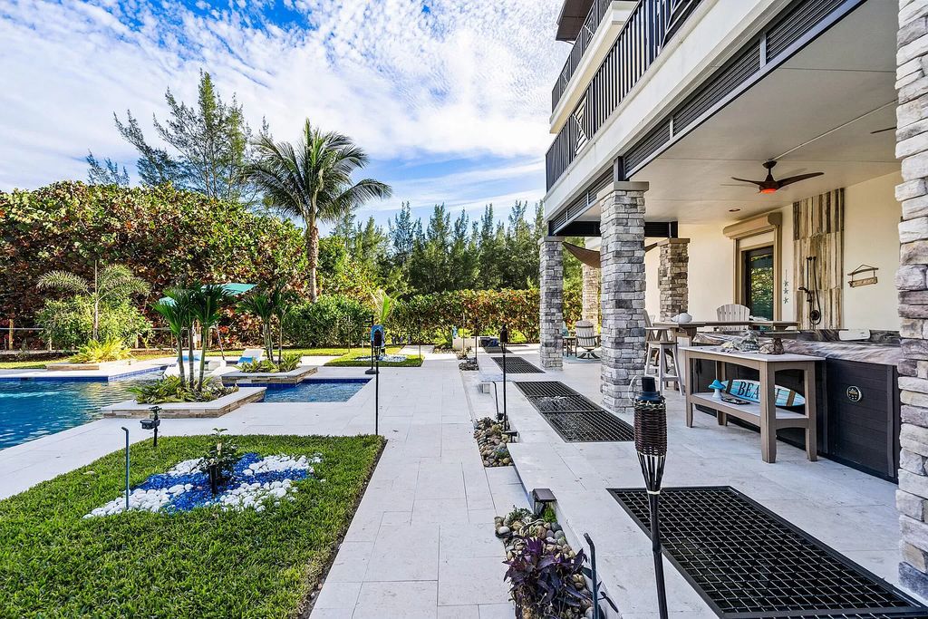 With dual A/C garages and durable coastal design elements throughout, including marine-grade paint and impact glass, this 3-bedroom, 5-bathroom home on a 0.65-acre lot at 3800 Anacostia Pl, Fort Pierce, FL 34949, built in 2019, presents an exceptional opportunity to embrace the coastal lifestyle in utmost comfort and elegance.