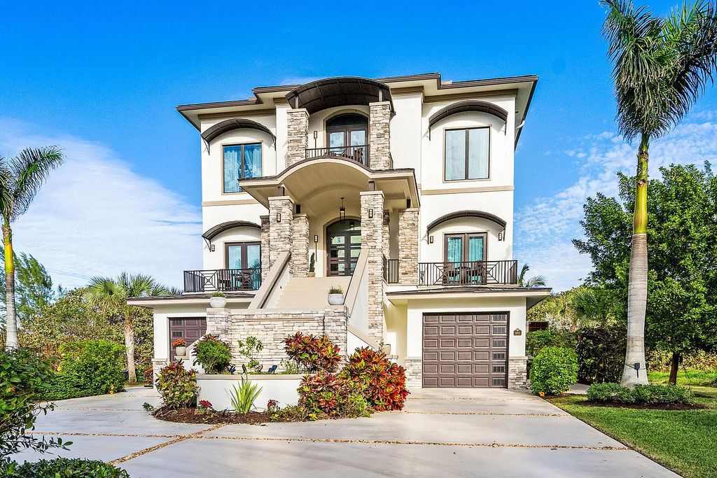 With dual A/C garages and durable coastal design elements throughout, including marine-grade paint and impact glass, this 3-bedroom, 5-bathroom home on a 0.65-acre lot at 3800 Anacostia Pl, Fort Pierce, FL 34949, built in 2019, presents an exceptional opportunity to embrace the coastal lifestyle in utmost comfort and elegance.