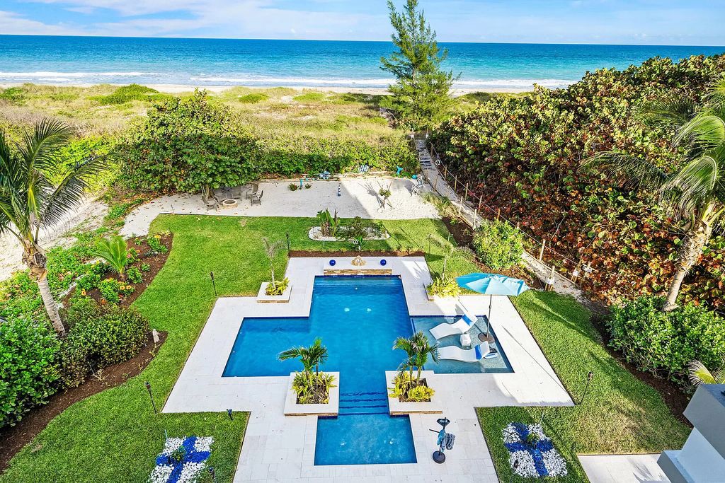 With dual A/C garages and durable coastal design elements throughout, including marine-grade paint and impact glass, this 3-bedroom, 5-bathroom home on a 0.65-acre lot at 3800 Anacostia Pl, Fort Pierce, FL 34949, built in 2019, presents an exceptional opportunity to embrace the coastal lifestyle in utmost comfort and elegance.