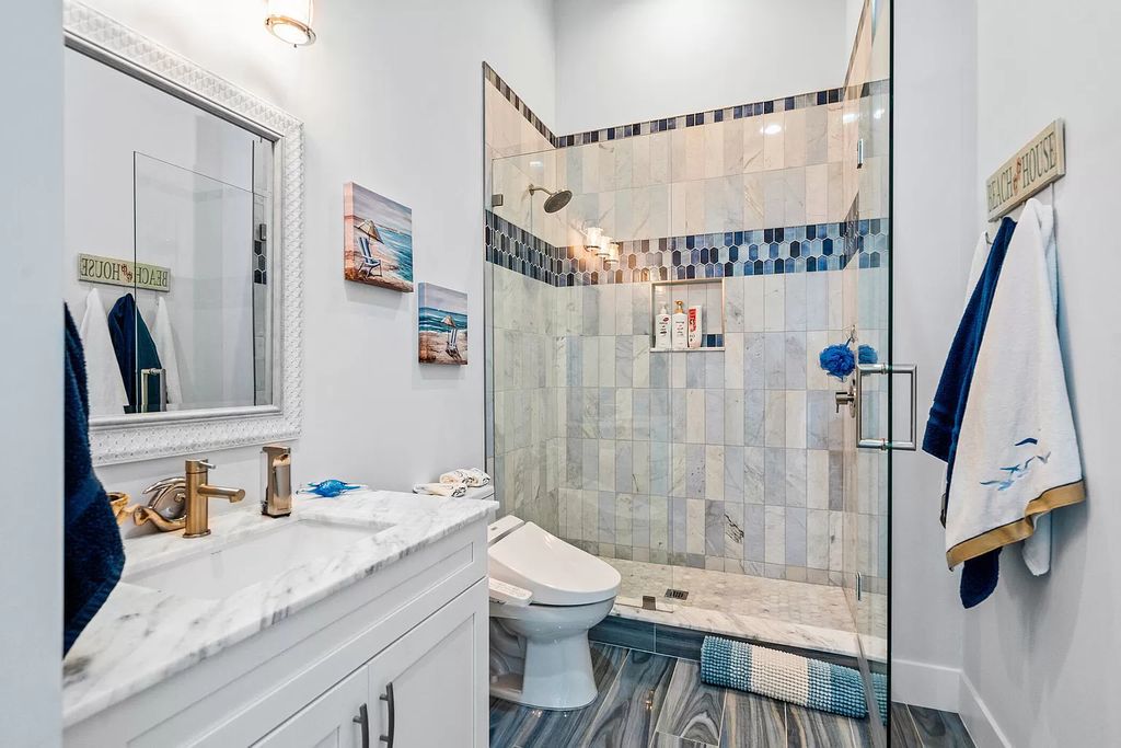 With dual A/C garages and durable coastal design elements throughout, including marine-grade paint and impact glass, this 3-bedroom, 5-bathroom home on a 0.65-acre lot at 3800 Anacostia Pl, Fort Pierce, FL 34949, built in 2019, presents an exceptional opportunity to embrace the coastal lifestyle in utmost comfort and elegance.