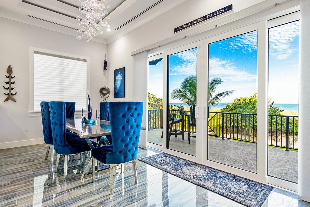 With dual A/C garages and durable coastal design elements throughout, including marine-grade paint and impact glass, this 3-bedroom, 5-bathroom home on a 0.65-acre lot at 3800 Anacostia Pl, Fort Pierce, FL 34949, built in 2019, presents an exceptional opportunity to embrace the coastal lifestyle in utmost comfort and elegance.