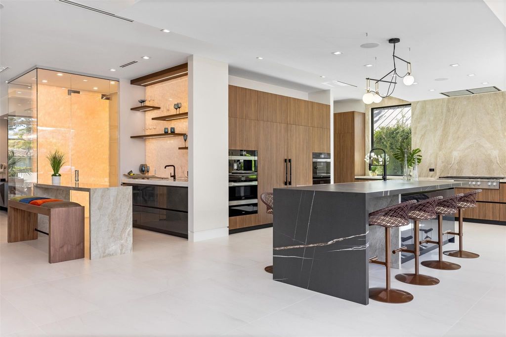 Indulge in unparalleled luxury at 2733 NE 16th St, Fort Lauderdale, FL 33304—an exceptional 5-bedroom, 7-bathroom estate built in 2024 in Coral Ridge.