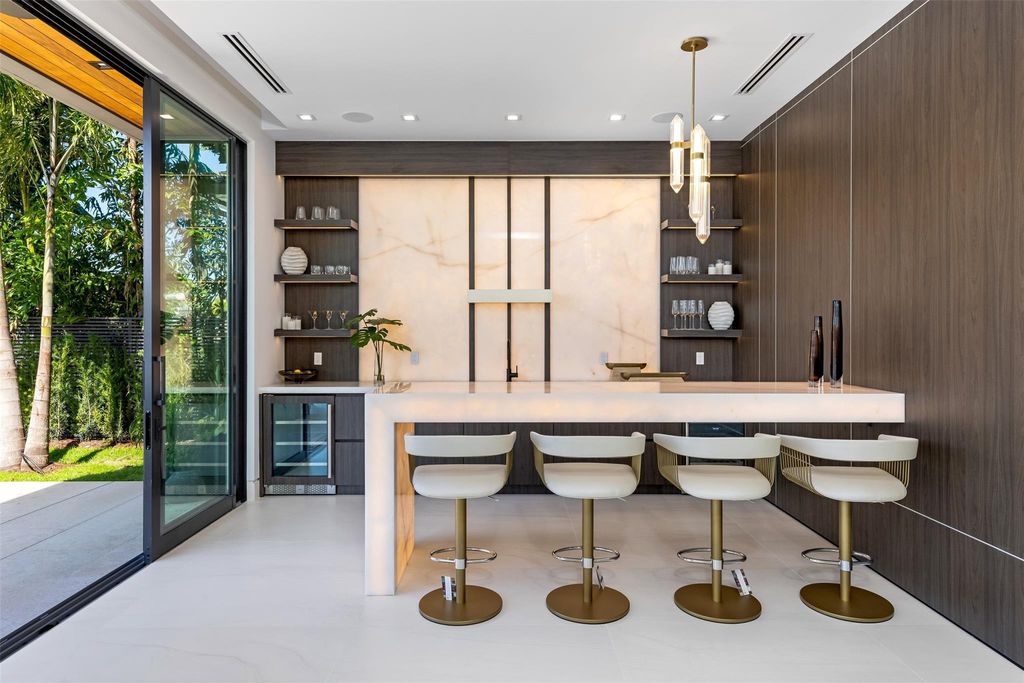 Indulge in unparalleled luxury at 2733 NE 16th St, Fort Lauderdale, FL 33304—an exceptional 5-bedroom, 7-bathroom estate built in 2024 in Coral Ridge.