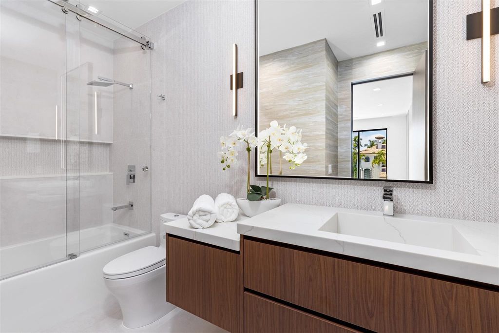 Indulge in unparalleled luxury at 2733 NE 16th St, Fort Lauderdale, FL 33304—an exceptional 5-bedroom, 7-bathroom estate built in 2024 in Coral Ridge.