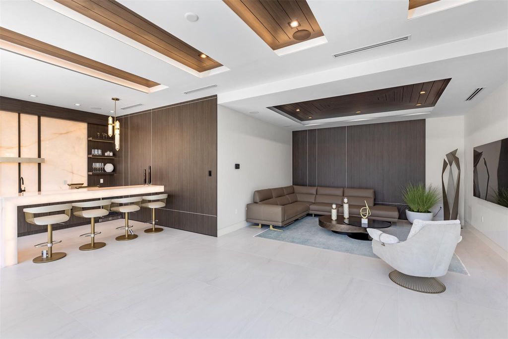 Indulge in unparalleled luxury at 2733 NE 16th St, Fort Lauderdale, FL 33304—an exceptional 5-bedroom, 7-bathroom estate built in 2024 in Coral Ridge.