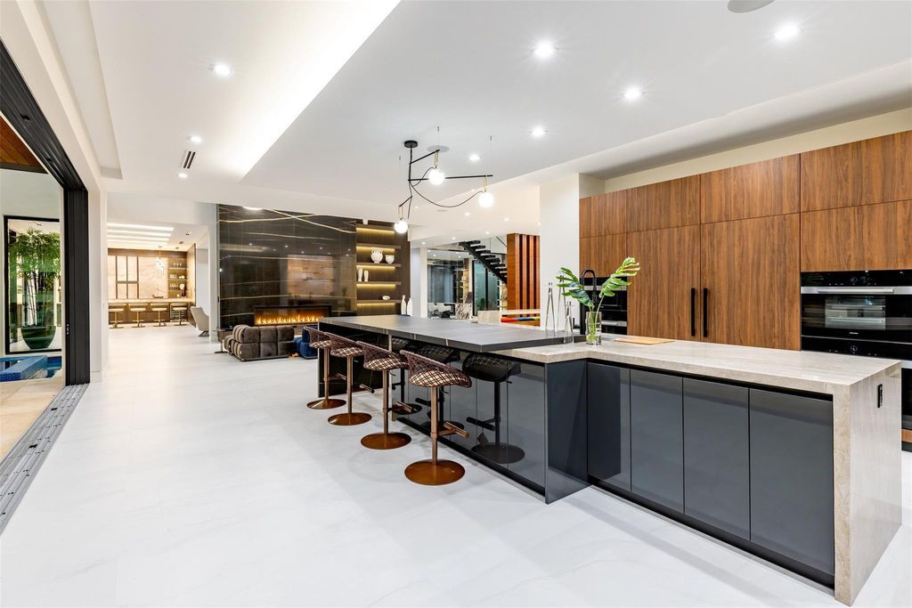 Indulge in unparalleled luxury at 2733 NE 16th St, Fort Lauderdale, FL 33304—an exceptional 5-bedroom, 7-bathroom estate built in 2024 in Coral Ridge.