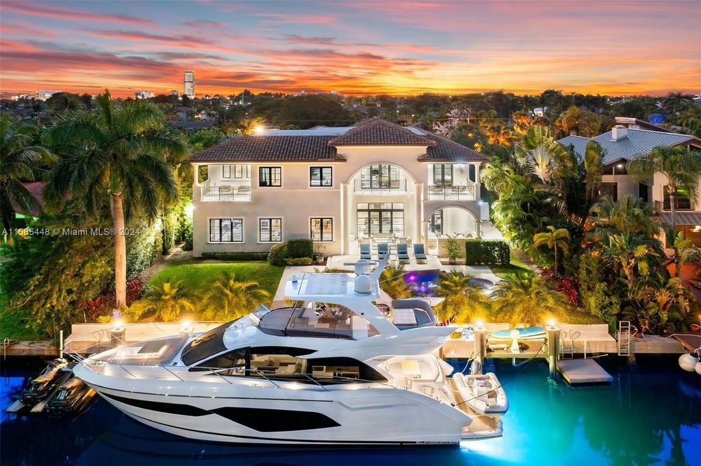 Located in the prestigious gated community of Golden Isles, this exquisite waterfront home at 631 Hibiscus Dr, Hallandale Beach, boasts six bedrooms and seven and a half opulent bathrooms within its 5,829 square feet of refined living space