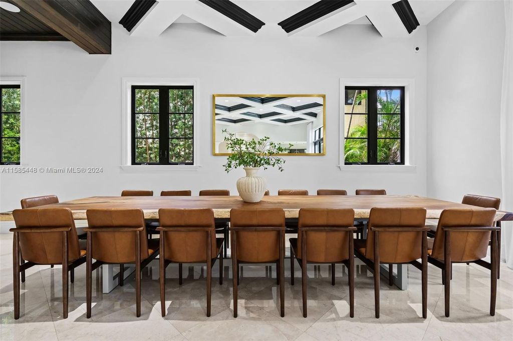 Located in the prestigious gated community of Golden Isles, this exquisite waterfront home at 631 Hibiscus Dr, Hallandale Beach, boasts six bedrooms and seven and a half opulent bathrooms within its 5,829 square feet of refined living space