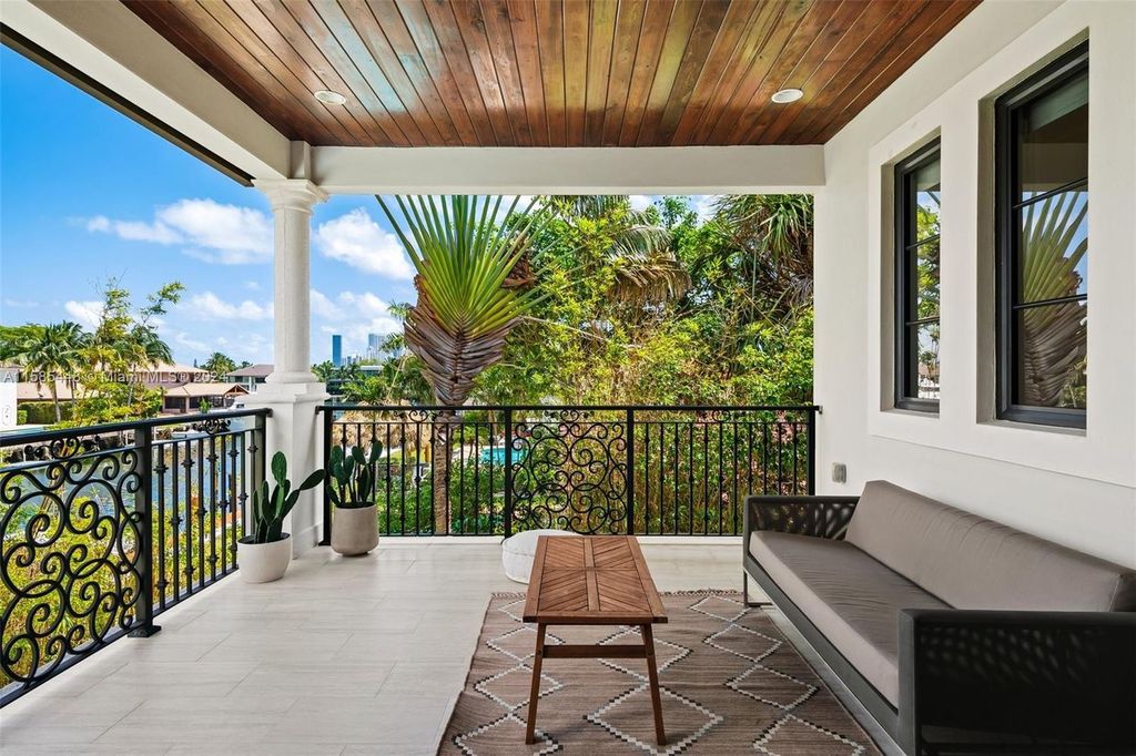 Located in the prestigious gated community of Golden Isles, this exquisite waterfront home at 631 Hibiscus Dr, Hallandale Beach, boasts six bedrooms and seven and a half opulent bathrooms within its 5,829 square feet of refined living space