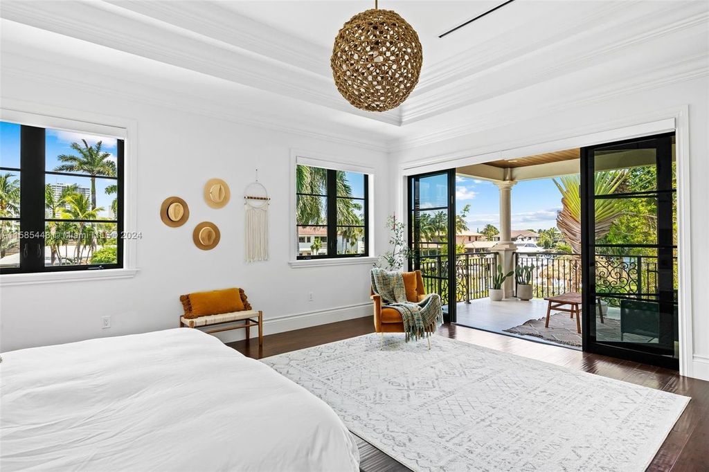 Located in the prestigious gated community of Golden Isles, this exquisite waterfront home at 631 Hibiscus Dr, Hallandale Beach, boasts six bedrooms and seven and a half opulent bathrooms within its 5,829 square feet of refined living space