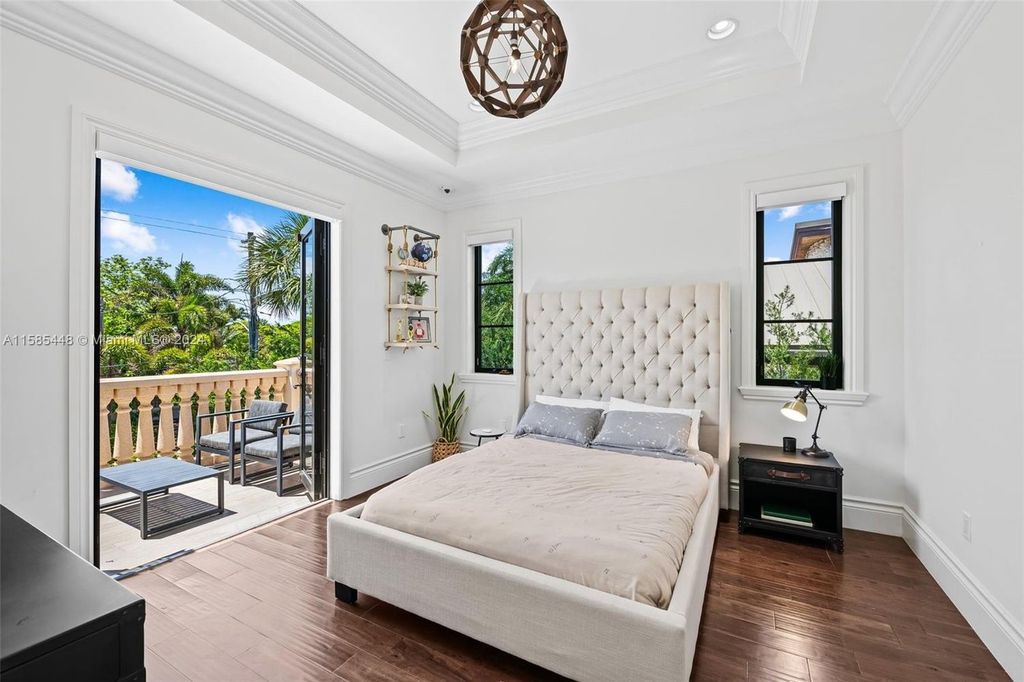 Located in the prestigious gated community of Golden Isles, this exquisite waterfront home at 631 Hibiscus Dr, Hallandale Beach, boasts six bedrooms and seven and a half opulent bathrooms within its 5,829 square feet of refined living space