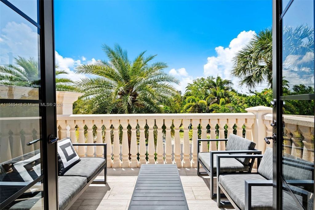 Located in the prestigious gated community of Golden Isles, this exquisite waterfront home at 631 Hibiscus Dr, Hallandale Beach, boasts six bedrooms and seven and a half opulent bathrooms within its 5,829 square feet of refined living space