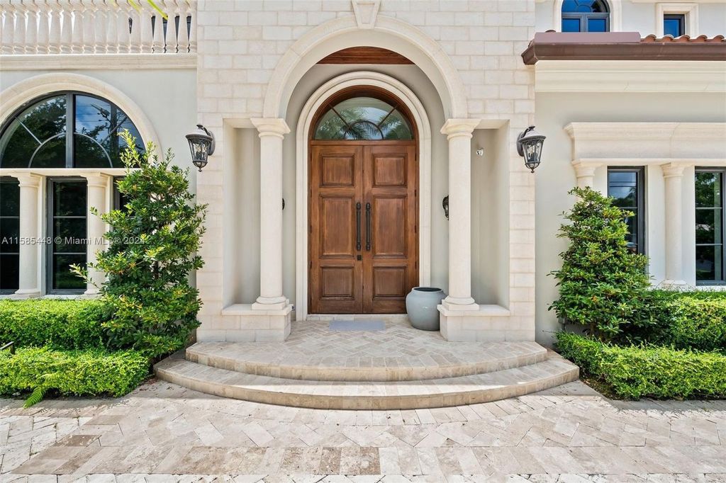 Located in the prestigious gated community of Golden Isles, this exquisite waterfront home at 631 Hibiscus Dr, Hallandale Beach, boasts six bedrooms and seven and a half opulent bathrooms within its 5,829 square feet of refined living space