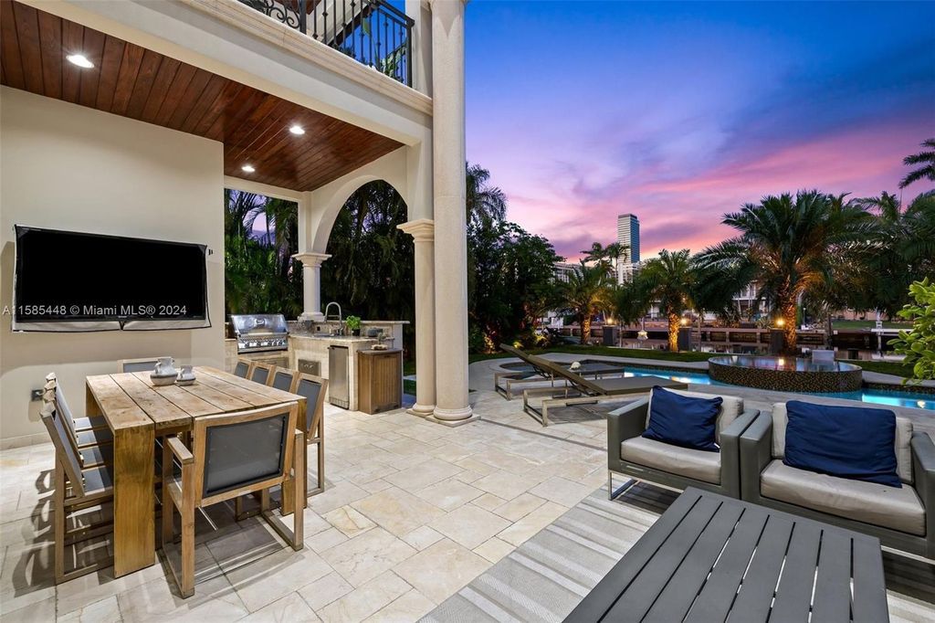 Located in the prestigious gated community of Golden Isles, this exquisite waterfront home at 631 Hibiscus Dr, Hallandale Beach, boasts six bedrooms and seven and a half opulent bathrooms within its 5,829 square feet of refined living space