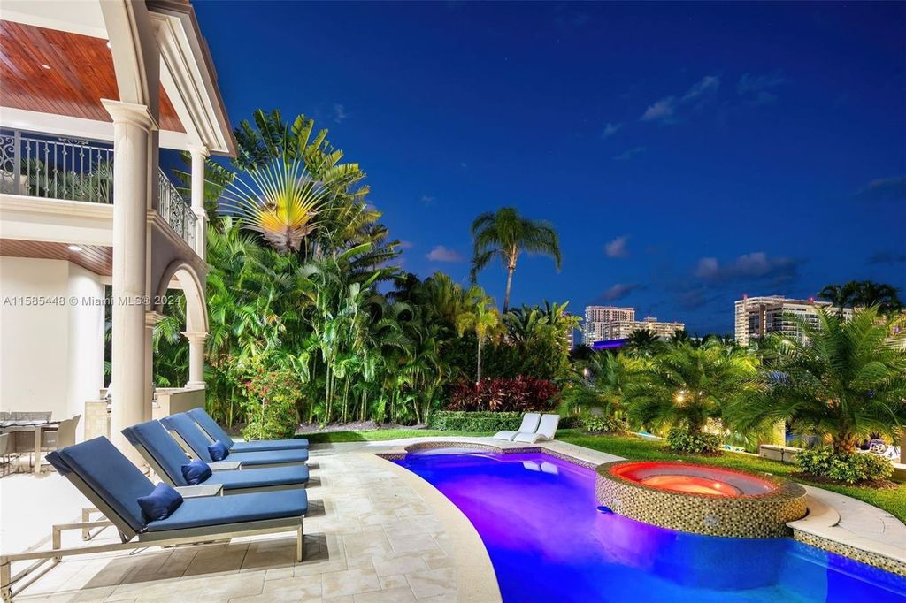 Located in the prestigious gated community of Golden Isles, this exquisite waterfront home at 631 Hibiscus Dr, Hallandale Beach, boasts six bedrooms and seven and a half opulent bathrooms within its 5,829 square feet of refined living space