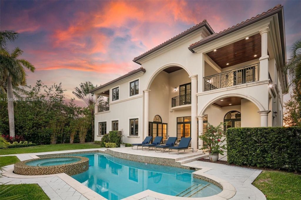 Located in the prestigious gated community of Golden Isles, this exquisite waterfront home at 631 Hibiscus Dr, Hallandale Beach, boasts six bedrooms and seven and a half opulent bathrooms within its 5,829 square feet of refined living space