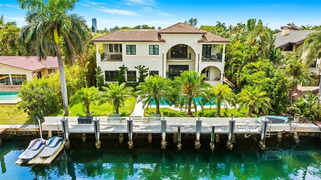 Located in the prestigious gated community of Golden Isles, this exquisite waterfront home at 631 Hibiscus Dr, Hallandale Beach, boasts six bedrooms and seven and a half opulent bathrooms within its 5,829 square feet of refined living space