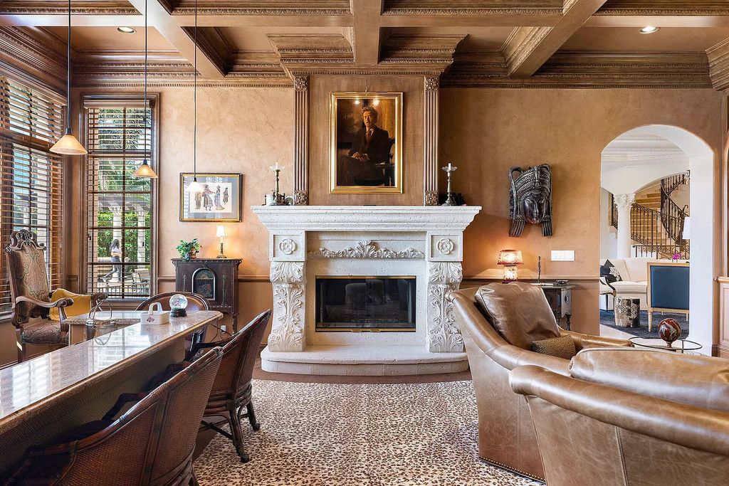 Discover unparalleled luxury at 336 E Coconut Palm Road in the prestigious Royal Palm Yacht & Country Club.