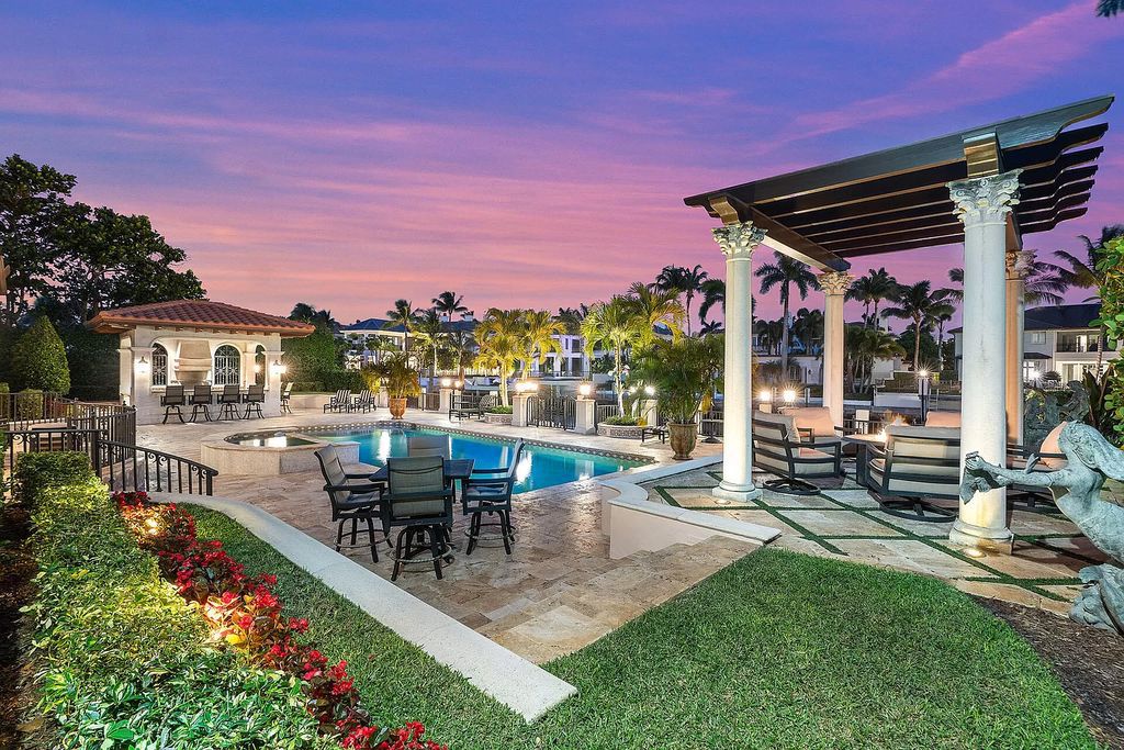 Discover unparalleled luxury at 336 E Coconut Palm Road in the prestigious Royal Palm Yacht & Country Club.
