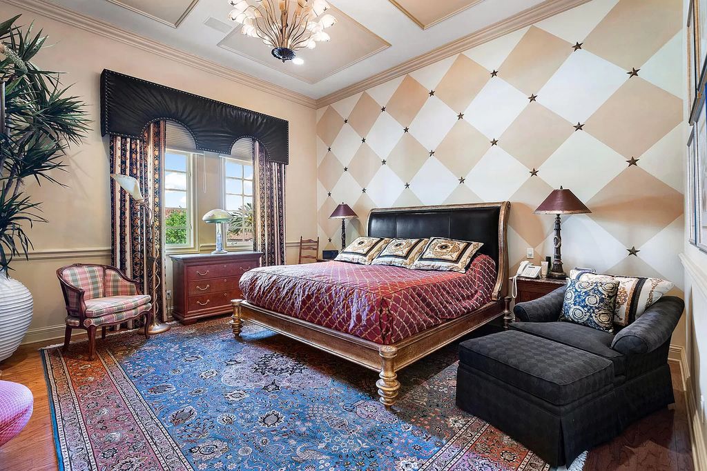Discover unparalleled luxury at 336 E Coconut Palm Road in the prestigious Royal Palm Yacht & Country Club.