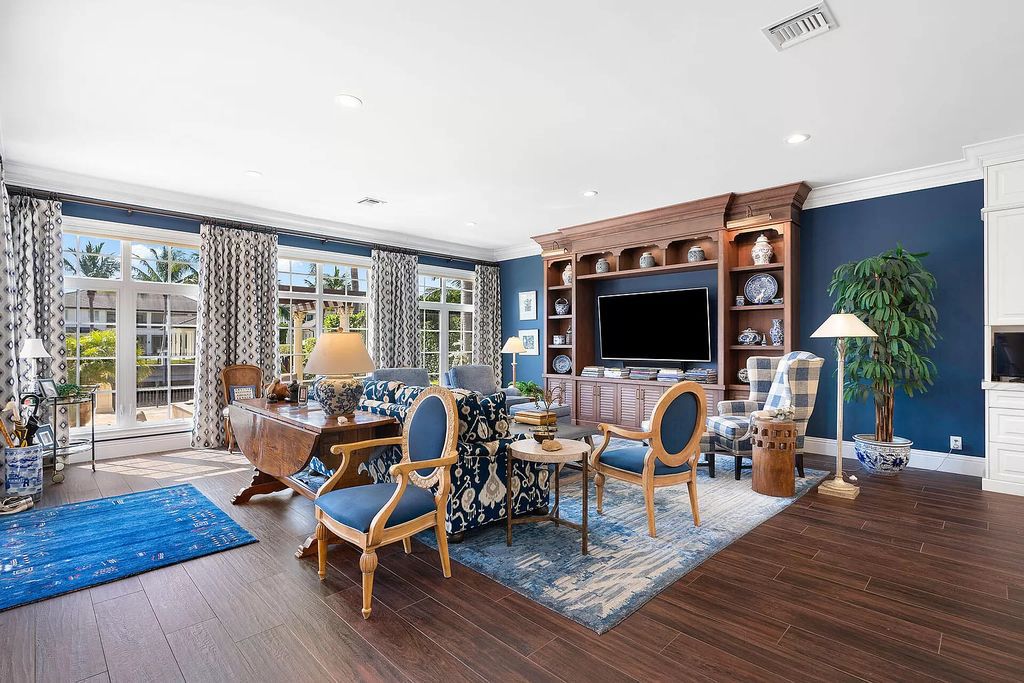 Discover unparalleled luxury at 336 E Coconut Palm Road in the prestigious Royal Palm Yacht & Country Club.