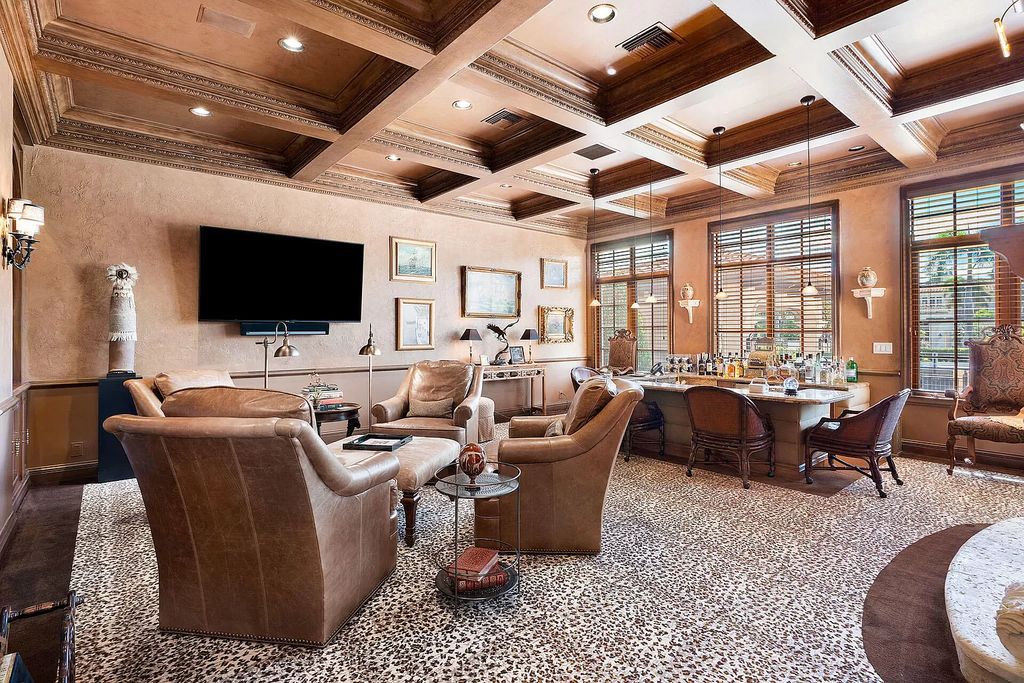 Discover unparalleled luxury at 336 E Coconut Palm Road in the prestigious Royal Palm Yacht & Country Club.
